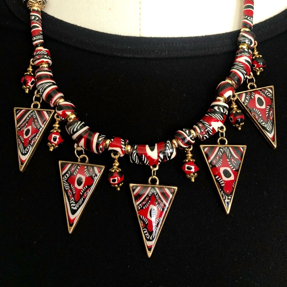 Red, black and white handmade necklace with matching earrings.